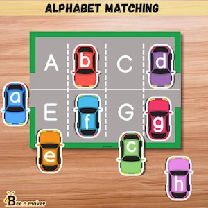May include: Alphabet matching game featuring a parking lot design with letters A through H. Colorful toy cars in blue, red, purple, orange, green, and pink are paired with corresponding letters. The text "ALPHABET MATCHING" is at the top.