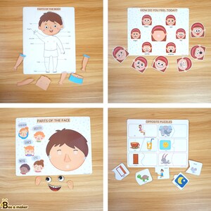 May include: Four white boards with colorful illustrations and text. The first board shows a human body with labels for different body parts. The second board shows different facial expressions with labels. The third board shows a face with labels for different facial features. The fourth board shows a set of opposite puzzles with pictures and labels.