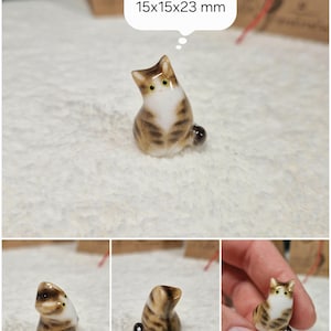 Cute Brown tabby cat figurine with green eyes. If you would like to change the eye color of the Brown with White tabby cat figurine to yellow, please select the "Eyes/Nose Changes" option.