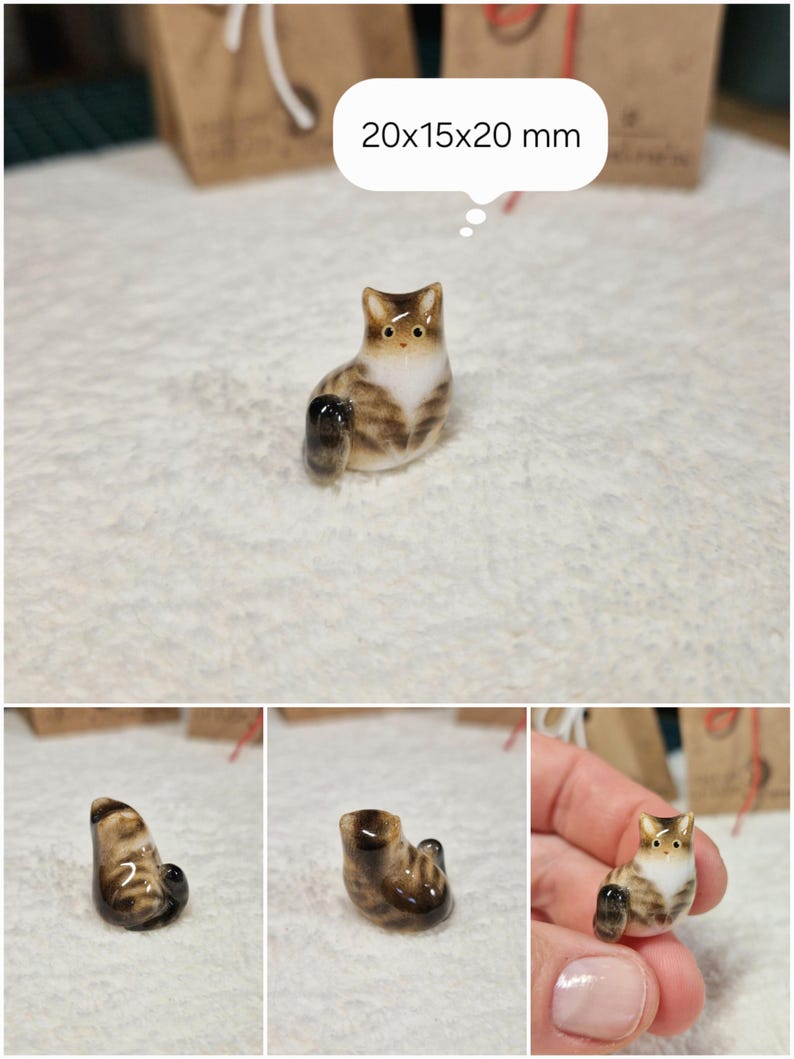 Sitting Brown tabby cat figurine with yellow eyes. If you would like to change the eye color of the Brown with white tabby cat figurine to green, please select the "Eyes/Nose Changes" option.
