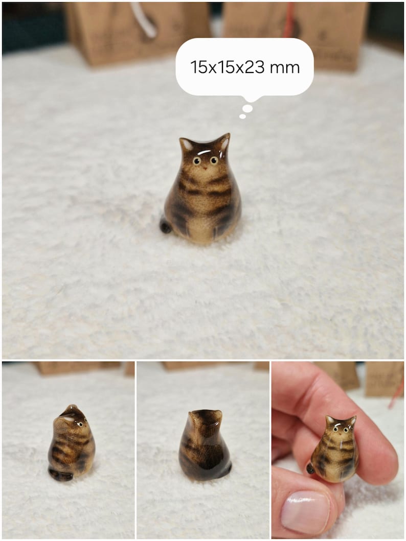 Fat Brown tabby cat figurine with yellow eyes. If you would like to change the eye color of the Brown tabby cat figurine to green, please select the "Eyes/Nose Changes" option.
