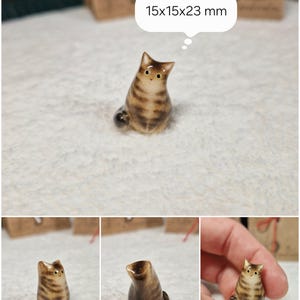 Slender Brown tabby cat figurine with yellow eyes. If you would like to change the eye color of the Brown tabby cat figurine to green, please select the "Eyes/Nose Changes" option.