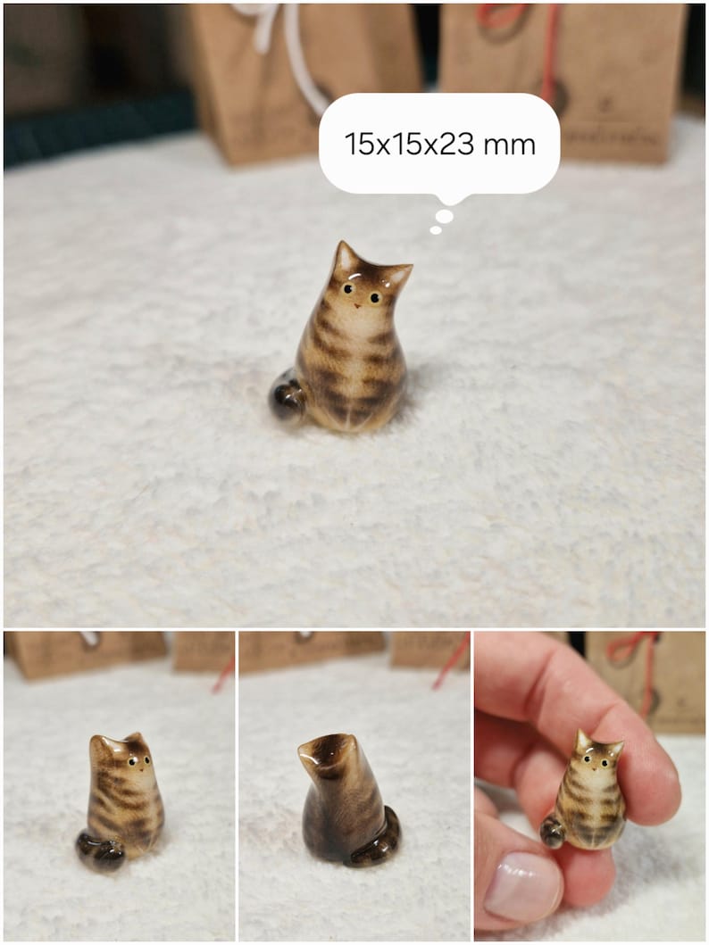 Slender Brown tabby cat figurine with yellow eyes. If you would like to change the eye color of the Brown tabby cat figurine to green, please select the "Eyes/Nose Changes" option.