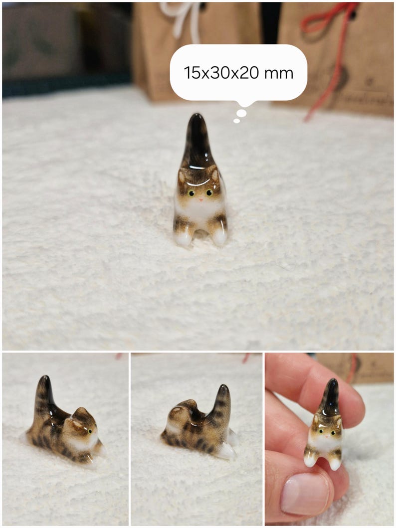 Playful Brown tabby cat figurine with yellow eyes. If you would like to change the eye color of the Brown with White tabby cat figurine to green, please select the "Eyes/Nose Changes" option.