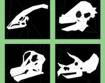 May include: Four black and white images of dinosaur skulls, each with a different shape and design. The skulls are made of paper and are cut out in a geometric style.