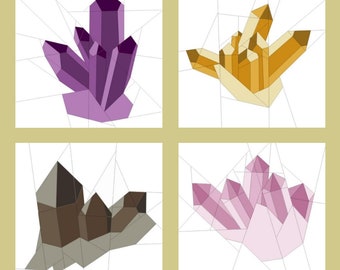 May include: Four different geometric crystal designs in a patchwork style. The crystals are purple, orange, brown, and pink.