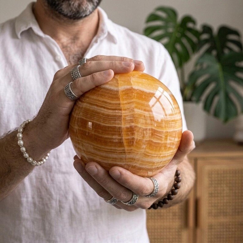 banded orange calcite sphere