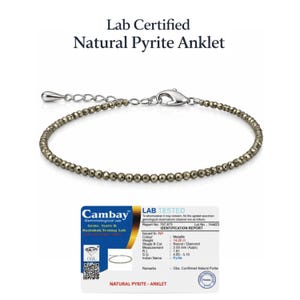 May include: A lab-certified natural pyrite anklet. The anklet features small, metallic-colored beads strung together with a silver-colored clasp. The image includes a gemological lab report. The text on the image reads "Natural Pyrite Anklet."