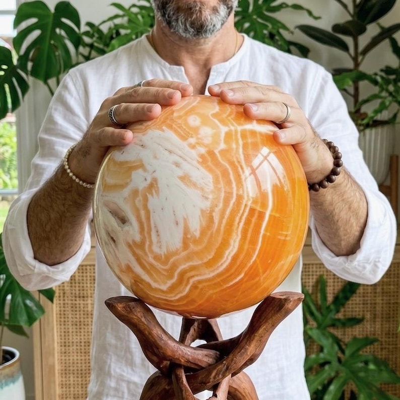 giant orange calcite sphere