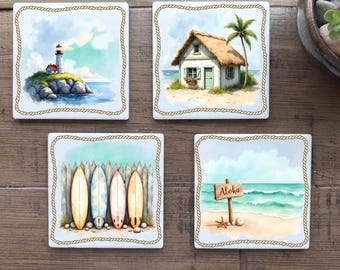 May include: Set of four square ceramic coasters with watercolor beach scenes. Designs include a lighthouse, a beach house, surfboards, and a beach scene with an "Aloha" sign. Each coaster has a rope-like border.