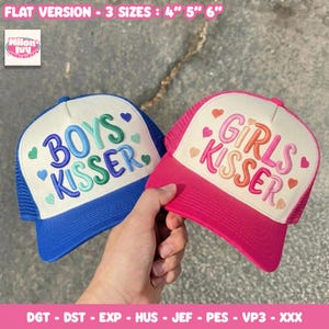May include: Two trucker hats with white front panels and mesh backs. The left hat is blue with the text BOYS KISSER in blue and green embroidery and small hearts. The right hat is pink with the text GIRLS KISSER in pink and orange embroidery and small hearts.