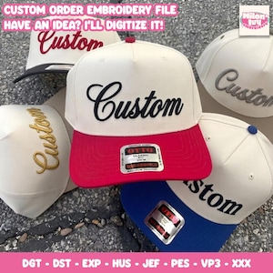 May include: Five baseball caps with off-white crowns and various colored brims, including red, blue, and black. Each cap features the word Custom embroidered in cursive script on the front panel. Stickers are visible on the brims.