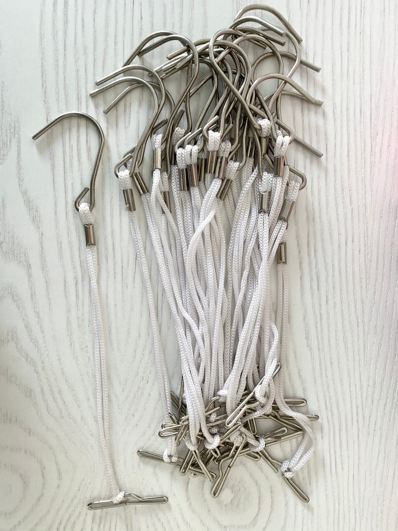 12 dozen Pattern hook hangers with cord for sloperspattern block