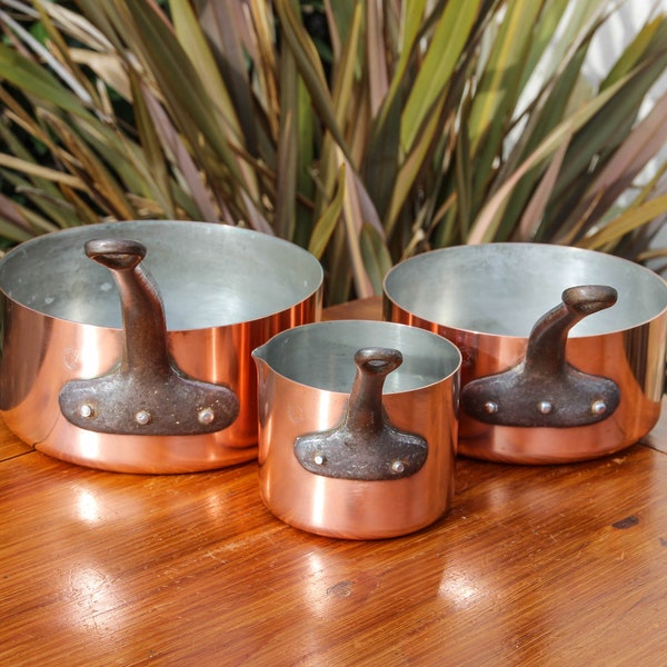 Set of 3 vintage FABRICATION FRANCAISE copper pans with cast iron handles and metal rivets / French graduated copper cookware set