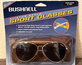 Vintage BUSHNELL Aviator Style Sport Shooting Glasses, Gold Tone Metal Frames, Smoke Color Lense, Original Package, Nose Pads, Brow Bar, NIP