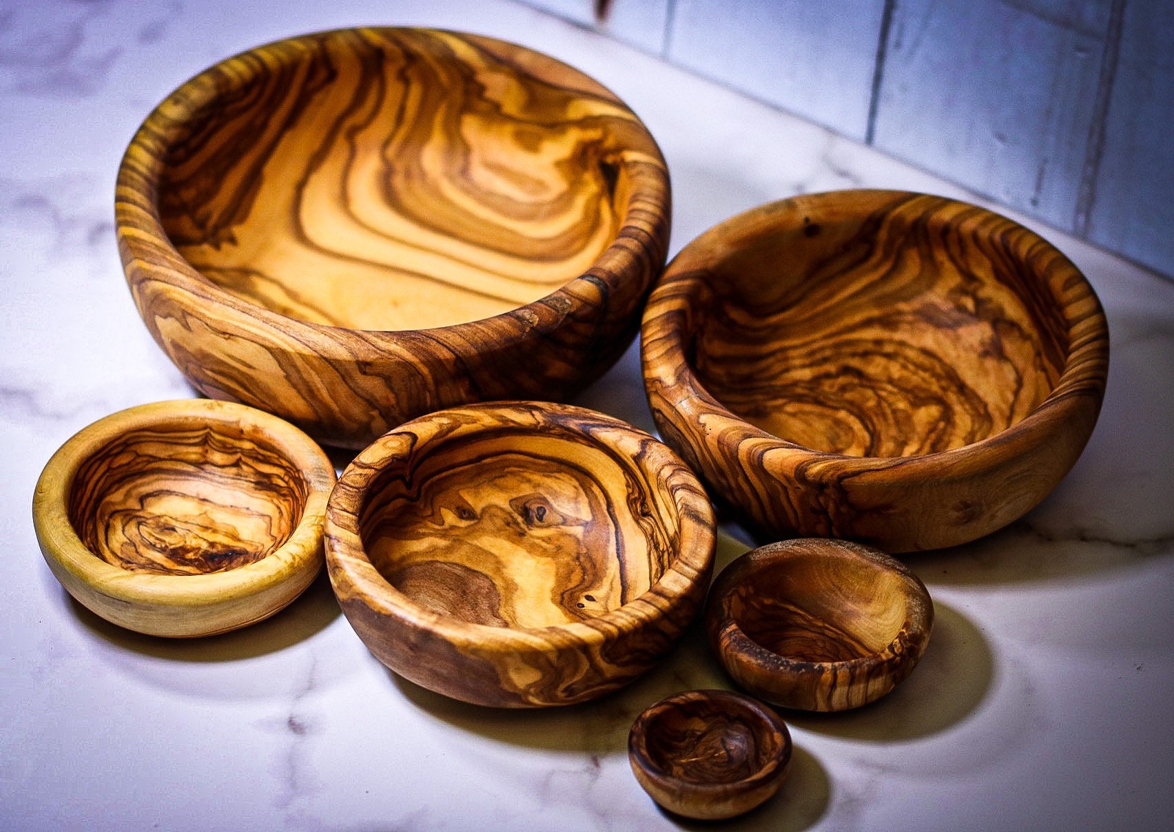 Olive Wood Cutting Board with Handle at BeldiNest