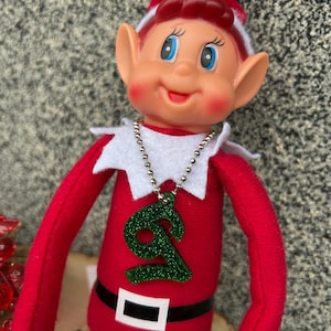 Cheeky Elf 6 7 cuffs prop Christmas Elf is back necklace