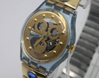 1992 vintage Gents Swatch 'Gold Smile' GN123/124, état NEAR MINT, fonctionnant à 100% avec le bracelet d'origine