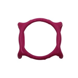 May include: A magenta-coloured, circular object with a unique, curved design. The object has a smooth texture and appears to be made of a solid material. The design features four distinct, rounded protrusions evenly spaced around the circle.