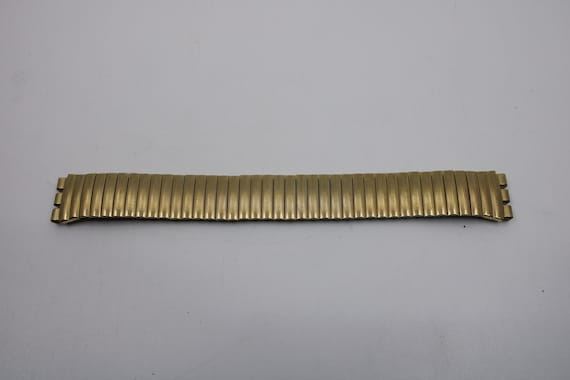 1999, Vintage Swatch Gold Flexi Strap, 17mm, New … - image 1