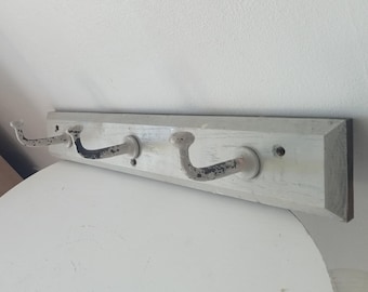 Vintage wall-mounted coat rack from the 1930s/40s