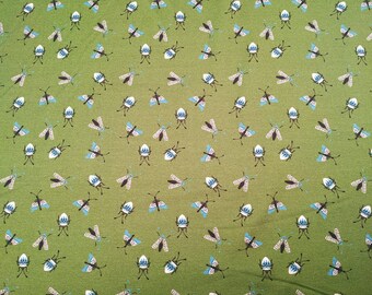 Fabbies T-shirt fabric with insects on a green background