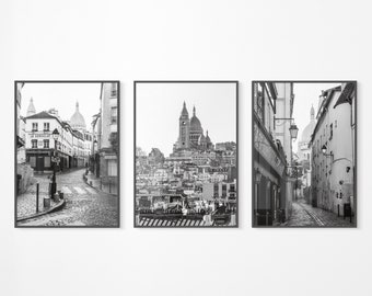 May include: Three black and white photographs of Parisian streets. The first photo shows a street with a building that says "Le Consulat" on the side. The second photo shows a view of the Sacré-Cœur Basilica. The third photo shows a narrow street with a building that says "Au Coin du Feu" on the side.