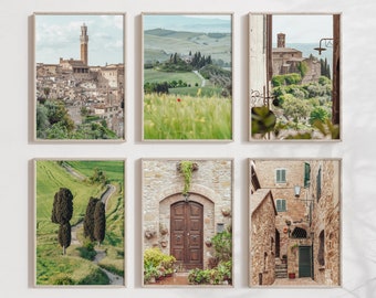 May include: Set of six framed prints featuring scenic views of a Tuscan town. The prints showcase a variety of architectural details, including a tall tower, a stone archway, and a winding road through rolling hills.