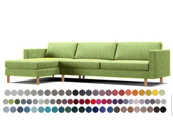 May include: A green sectional sofa with a chaise lounge. The sofa has a light green fabric upholstery and wooden legs. The sofa is available in a variety of colors.