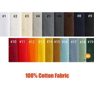 May include: Swatch card of 19 different solid color 100% cotton fabrics. The colors include white, beige, gray, brown, black, red, orange, yellow, gold, green, and blue.