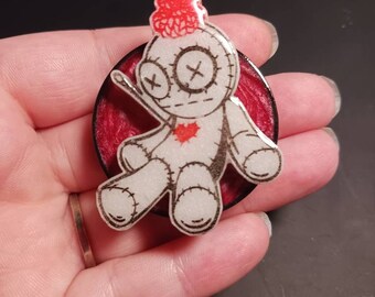 Voodoo doll phone grippy or badge reel