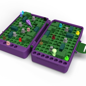 May include: A purple travel game with a green playing surface and a variety of colorful game pieces. The game is open and shows the playing surface with a maze pattern. The game is labeled "@kennethrmiser".