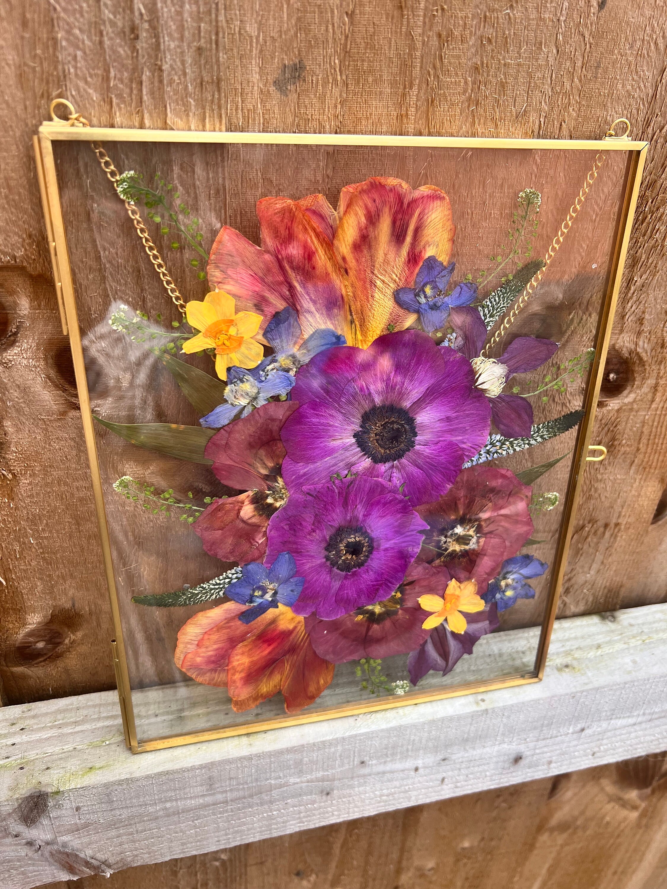 Flower frames with pressed violas