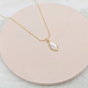 gold-plated chain with mother-of-pearl pendant