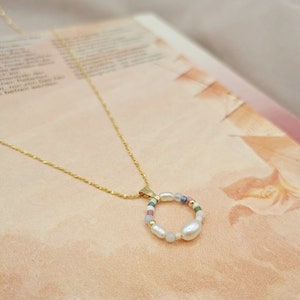 gold-plated chain with pearl pendant