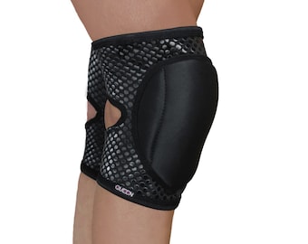 May include: Black knee pad with a honeycomb pattern and a thick black padding. The knee pad has the word "QUEEN" printed on it.