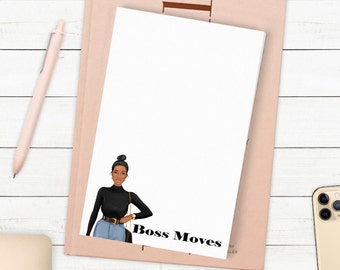 May include: A white notepad with a black and white illustration of a woman wearing a black turtleneck, blue jeans, and a belt. The text "Boss Moves" is printed in black at the bottom of the notepad.