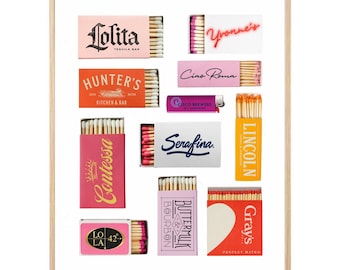 May include: A framed collage of matchboxes with various designs and names, including Lolita Tequila Bar, Yvonne's, Ciao Roma, Hunter's Kitchen & Bar, Cisco Brewers, Contessa, Serafina, Lincoln, Buttermilk & Bourbon, Lo 42 LA, and Gray's Perfect Match.