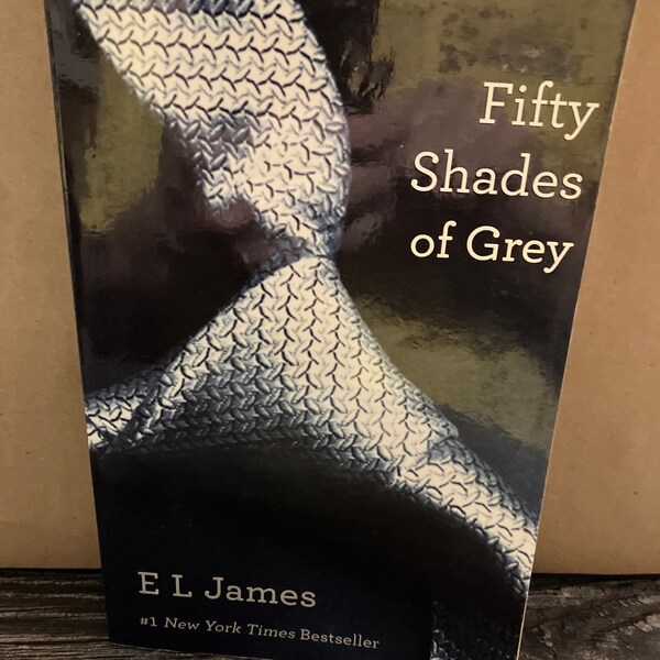 Fifty Shades Of Grey: Book One of the Fifty Shades Trilogy (Fifty Shades of Grey Series, 1) Paperback – April 3, 2012 by E L James NEW BOOK