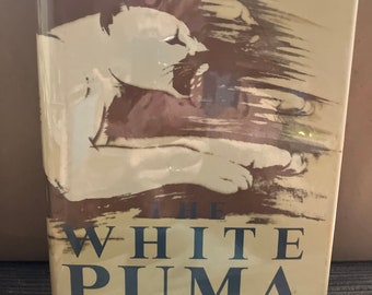 The White Puma: A Novel Hardcover – January 1, 1990 by R. D. Lawrence LIKE NEW Former Library Book