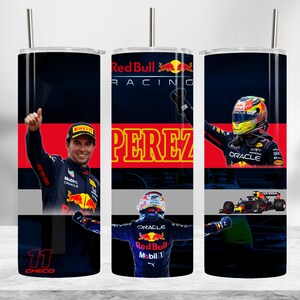 May include: A black and blue stainless steel tumbler with a red bull racing logo, the name "Perez" in yellow letters, and a photo of a race car driver wearing a red bull racing helmet. The tumbler has a black straw and the number "11" with the word "Checo" underneath.