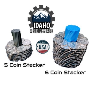 May include: Two coin stackers, one holding five coins and the other holding six coins. The stackers are made of silver-colored coins and have a central support. The text "5 Coin Stacker" and "6 Coin Stacker" are below the respective stackers. The image also includes a "Made in USA" emblem.