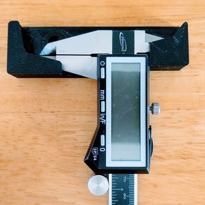 Caliper Hanger