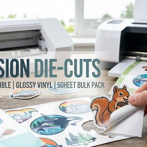 May include: White die-cut machines with printed sticker sheets. The stickers feature colorful designs, including a squirrel, mountains, and ocean scenes. Text on the image reads "PRECISION DIE-CUTS" and "MACHINE COMPATIBLE | GLOSSY VINYL | 50HEET BULK PACK."