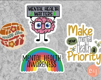 May include: Four colorful stickers with mental health awareness messages. The stickers feature a cartoon brain, a rainbow, and a flower design. The text on the stickers reads "Mental Health Matters", "Make Your Mental Health a Priority", "Mental Health Awareness", and "Grow with the Flow".