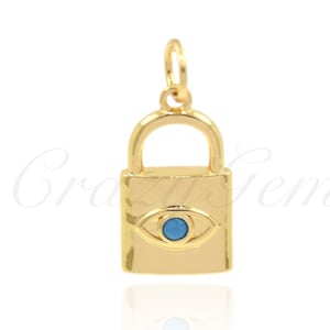 May include: Gold padlock charm with a blue evil eye design. The charm is a popular symbol of protection and good luck.