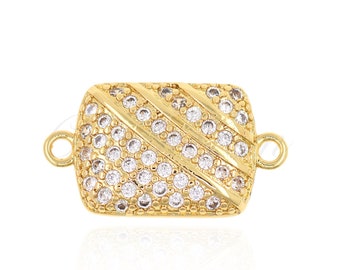 May include: Gold-toned rectangular clasp with clear crystal embellishments. The clasp has two loops on either side for attaching to a necklace or bracelet.