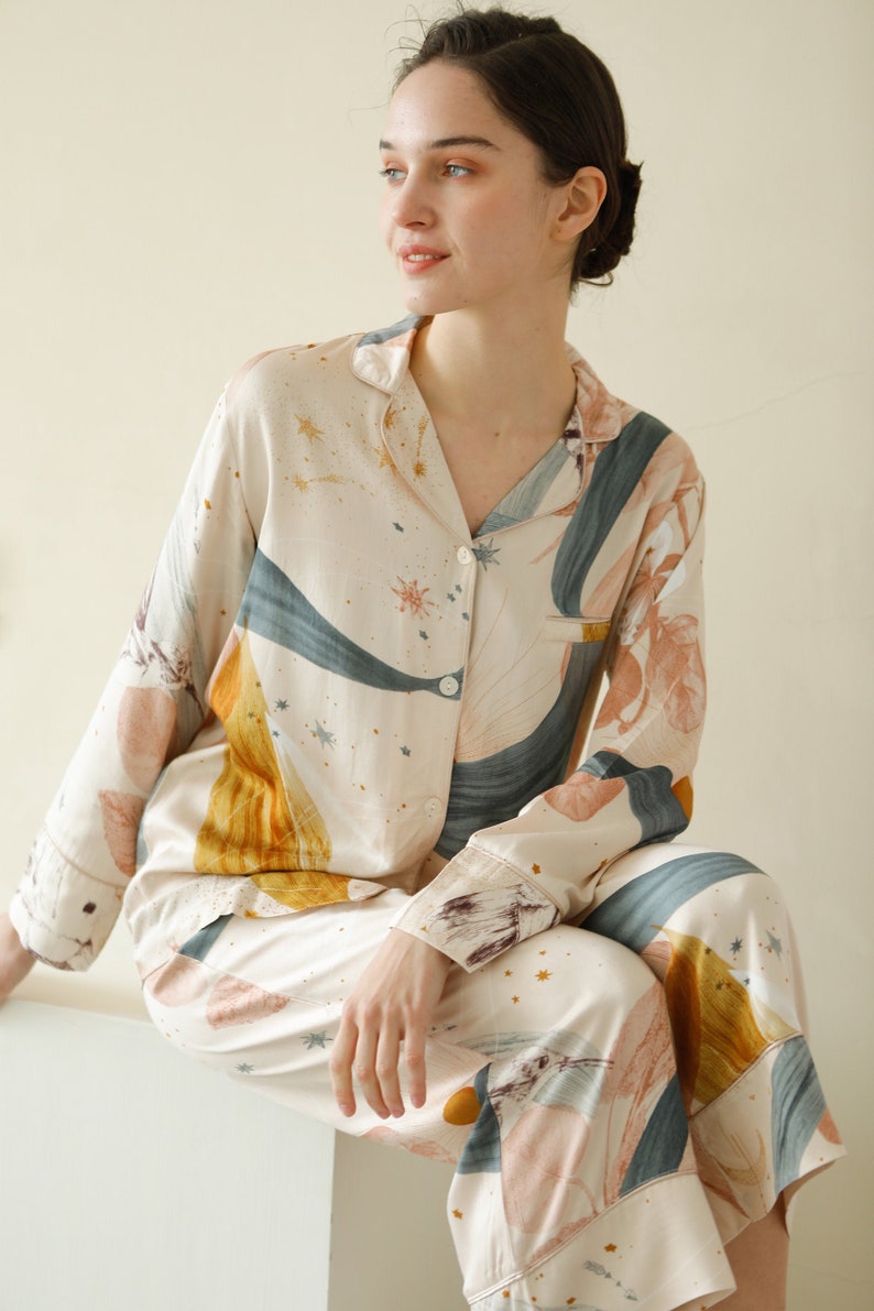 Pajamas made of comfortable, and breathable, and silky gentle fabric that has vintage and stylish, V-neck shirt, cozy and warm color will make the perfect gift on anniversary for your girlfriend