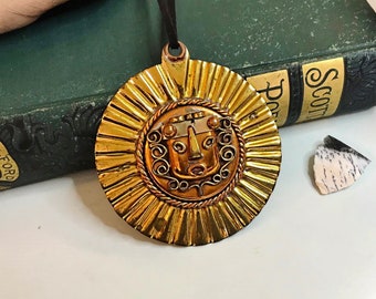 BraSS DisC MexiCaN MasK PENDANT, by CASA MAYA, vintage FLuTed MeDaLLion, MayaN AZTeC MasK,Brass God Tlaltecuhtli TonGue Sticking Out, 2-7/8&quot;