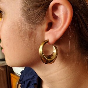 These vintage HALF HOOP EARRiNGS are FABULOUS!  They're gold vermeil over sterling.  The shape is a half hoop or crescent.  They're carinated and puffy or 3-d.  They're lightweight and wear beautifully.  I've left the original patina or tarnish.